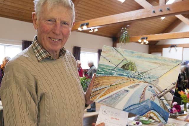 Norman Young won first prize for his oils and acrylics painting