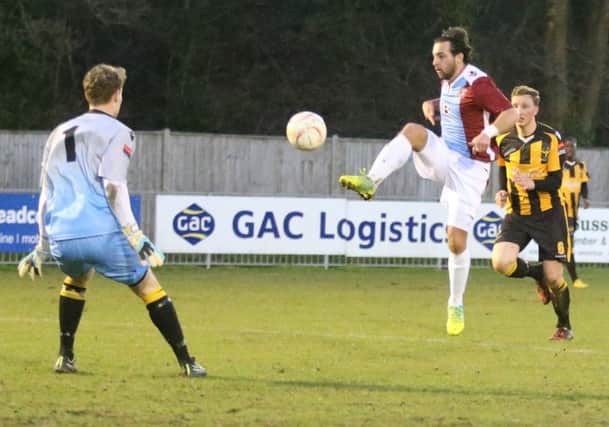 Billy Medlock scores Hastings United's winner away to East Grinstead Town on Tuesday night. Picture courtesy Scott White