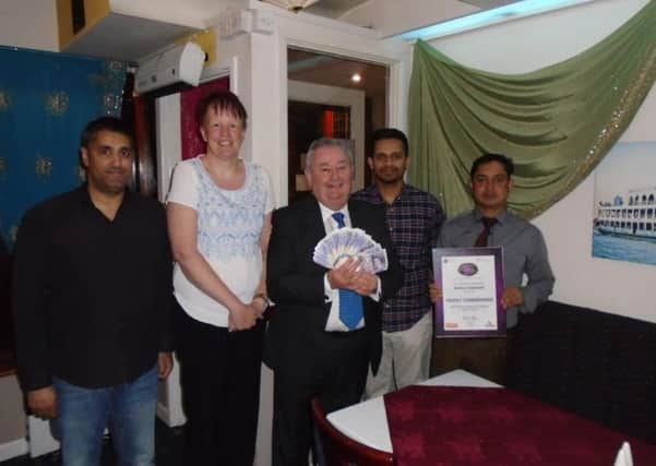 Sajjad Hussain, Mid Sussex Times, Sarah Dorrington Vice
President Burgess Hill District Lions, Phil Revis Chairman of 4Sight,
Mutahar Hussain and colleague of Shapla SUS-160804-140926001