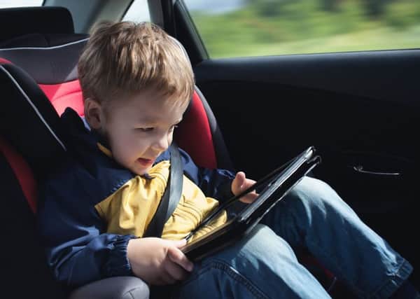 Tablet computers are one of the most popular ways of distracting misbehaving children SUS-160804-131747001