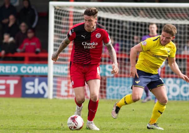 Sonny Bradley wins the ball for Crawley Town against Oxford United, 9th April 2016. (c) Jack Beard SUS-160904-223934008