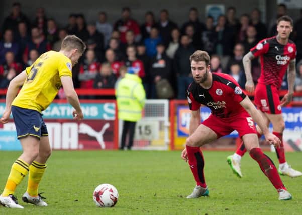 Joe McNerney tracks an attacker for Crawley Town against Oxford United, 9th April 2016. (c) Jack Beard SUS-160904-224055008