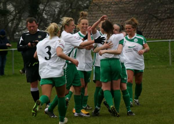 City celebrate a goal at Shanklin
