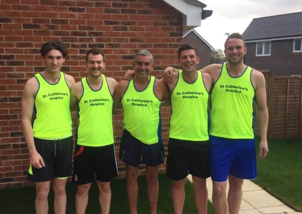 Four members of the Davie family Joe Max, Ben, and Steve are taking on the Brighton Marathon in aid of St Catherine's Hospice on Sunday 17 April in memory of their grandad, Jack - picture submitted