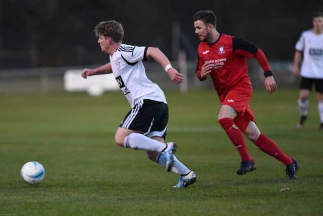 Loxwood's Byron Napper in action against Hassocks. Picture by Phil Westlake
