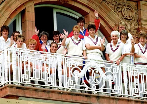 England celebrate with coach Ruth Prideaux (fifth from right) on the Lords balcony after winning the 1993 World Cup	Â© PA Photos