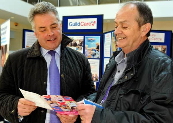 Tim Loughton (left), hosts the Pensioners Fair at the Guildbourne Centre, Worthing in 2015 WH. Pic Steve Robards SUS-150322-162222001
