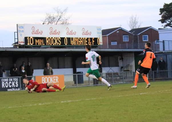 Alfie Rutherford puts Bognor ahead against Wingate / Picture by Tim Hale