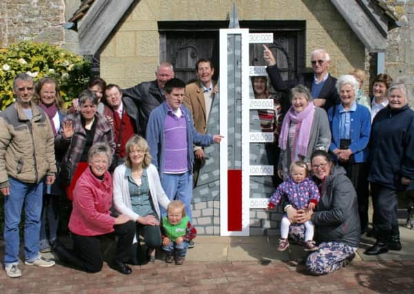 The appeal thermometer. Back row left to right: Ven Lionel Whatley, vicar of St. Margarets; Derek Shurvell, working party member; Erica Ansell, churchwarden; Trevor Swainson, working party chairman