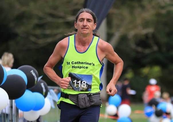 Craig Lovelock from Lindfield has completed 52 marathons in a year all over the world to raise money for St Catherine's Hospice - picture submitted euN0mgUEW3S9ucdfF3Dw