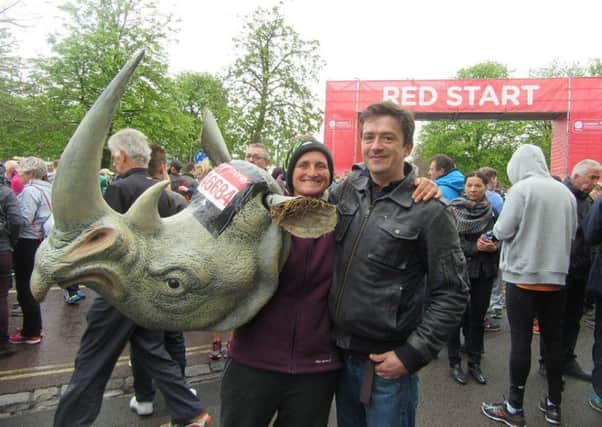 Berry White completes her 500 mile in marathons dressed as a rhino to raise funds for Save The Rhino SUS-160425-134134001
