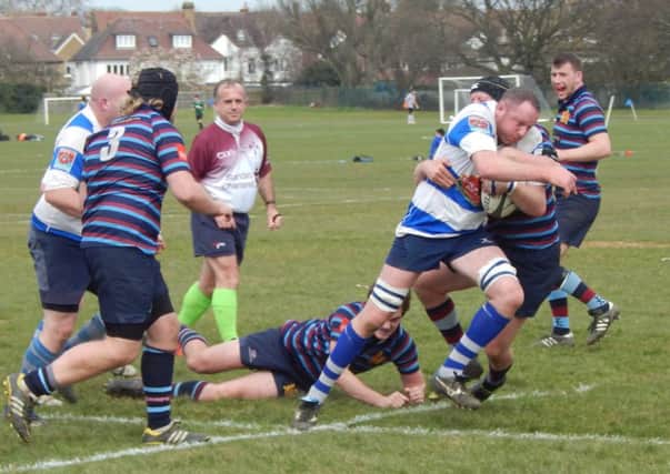 Hastings & Bexhill captain Jimmy Adams on the charge during the emphatic win away to King's College Hospital last time out. Picture courtesy Peter Knight