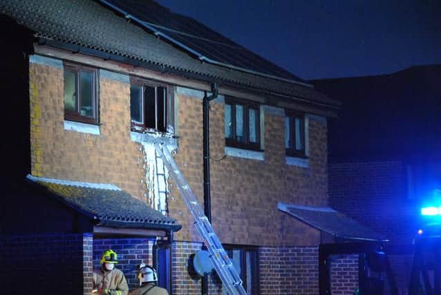 Firefighters tackle Eastbourne house fire SUS-160418-102042001