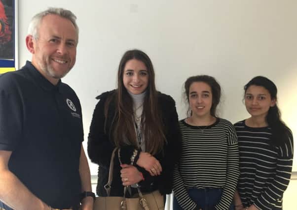 Steve Summers with students (left to right) Hannah Haines, Jemma Skipton-Carter and Sheaba Philip