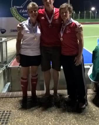 Sue Crake, Ian Brown and Suzy Clapp in Australia with their medals