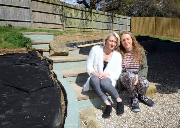 Toni Morris (left) wants to raise funds to finished their garden for her mum Maria Durling (right) who has incurable cancer