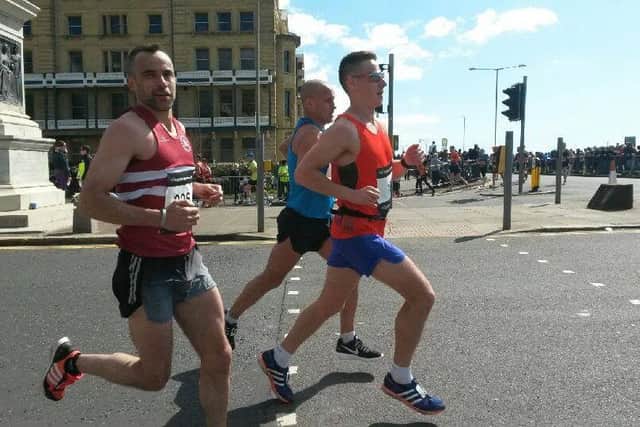 Paul Tomlinson on his way to 13th place in his first marathon