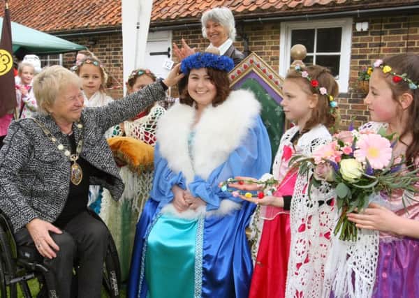 DM16115292a.jpg Ifield May Fayre. Mayor of Crawley Chris Cheshire crowns the May Queen Deanna Day. Photo by Derek Martin SUS-160205-174730008