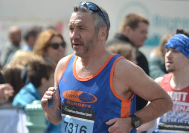 Mark Ponsford of Tone Zone at the Brighton Marathon / Picture by Heather Holcombe