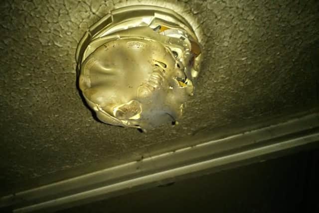Heat from the fire melted the smoke alarm. SUS-160419-165841001
