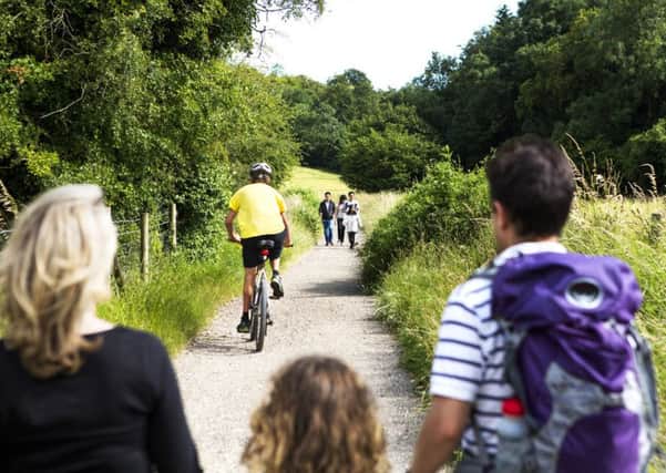 Walkers and cyclist at Kingley Vale