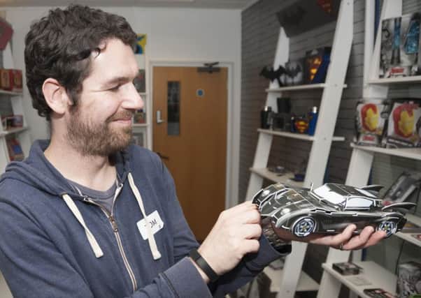 Tom pleased with his self-built Batmobile. Pictures: Graham Franks