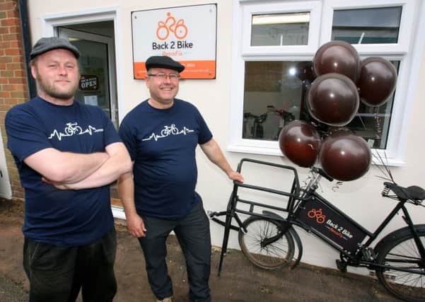 Tobias Sage, left, and Jon Thorne at Back2Bike, which opened in Ferring on Saturday. Picture: Derek Martin DM16111328a