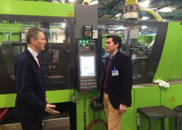 Marshall-Tufflex's production and assembly manager Keith Graham and Bexhill and Battle MP Huw Merriman on a tour of the factory