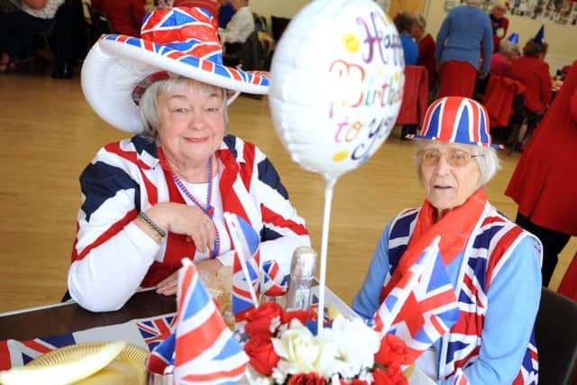 Shirley Cartwright and Dorris Cartwright from the Sainsbury's Veterans Association celebrating the Queen's birthday at St Peter's Community Centre
