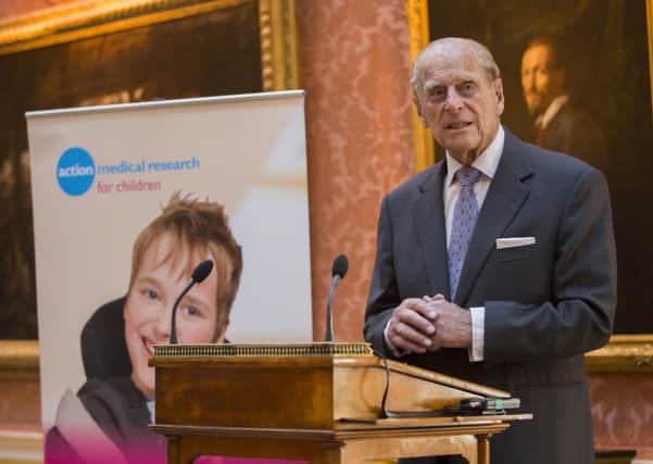 HRH Prince Philip welcoming guests to Buckingham Palace