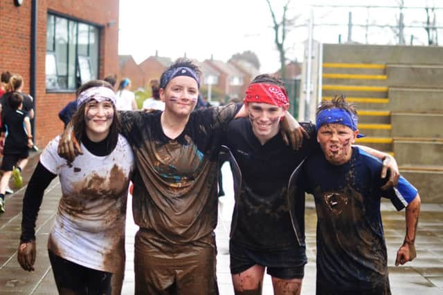 Muddy students after the Shoreham Academy Tough Runner