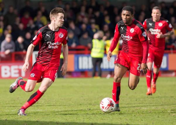 Gwion Edwards and Gavin Tomlin make an attacking run for Crawley Town against Oxford United, 9th April 2016. (c) Jack Beard SUS-160904-224251008