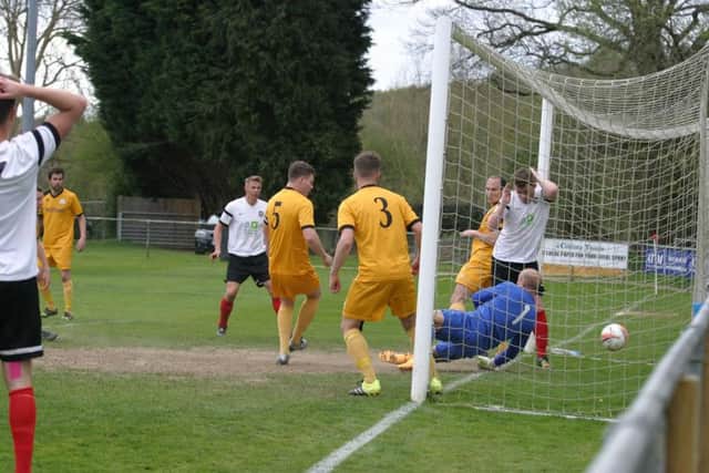 Antony Hibbert`s goal for YM planted in the Chichester City net. Photo by Clive Turner.jpg