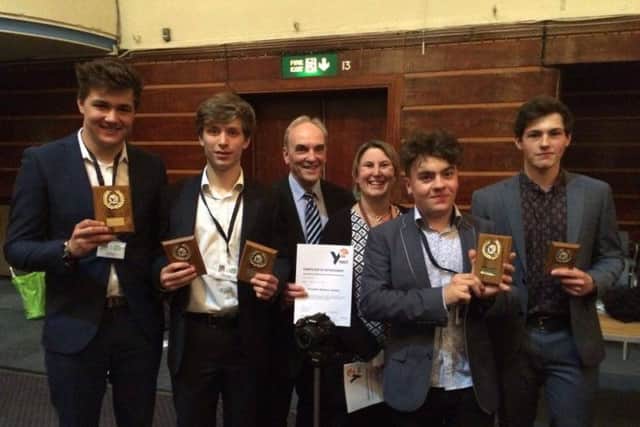 Bishop Luffa Young Enterprise company Zoom, pictured with their advisers, was named best company in the Arun and Chichester area SUS-160426-102354001