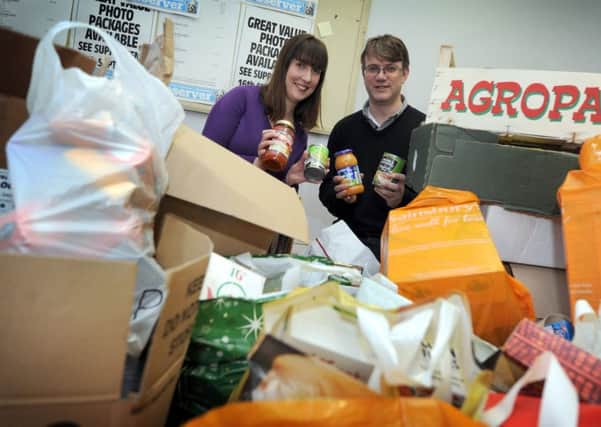 Hastings Foodbank collecting donations at the Hastings Observer office. SUS-160501-094033001