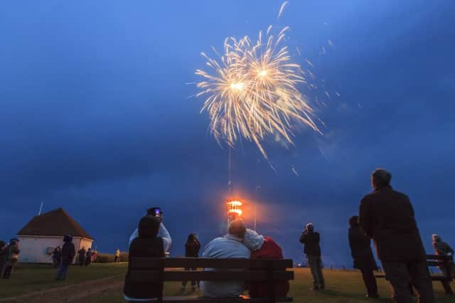 Fireworks went off after the beacon was lit on Galley Hill. Photo courtesy of JK Photography