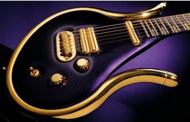 The gold-plated 'Purple Special' guitar was hand-made from cedar and carbon fibre