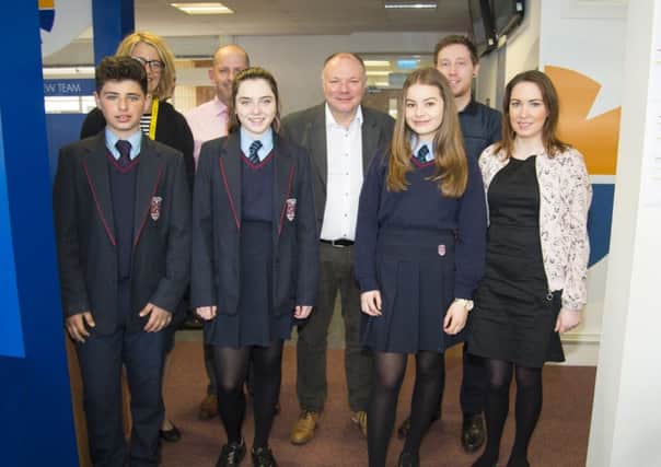 (L-R) Bexhill Academy student Max, Bexhill Academy's Trudy Hillman, Hastings Direct's Gary Chalmers, pupil Nikayla, Hastings' chief executive Gary Hoffman, student Lucy, Hastings' Jason Mitchell and Aoife Diamond