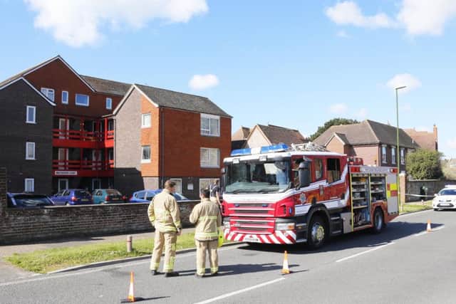 Firefighters and police at the scene of a fire in Maltravers Court in Maltravers Road, Littlehampton