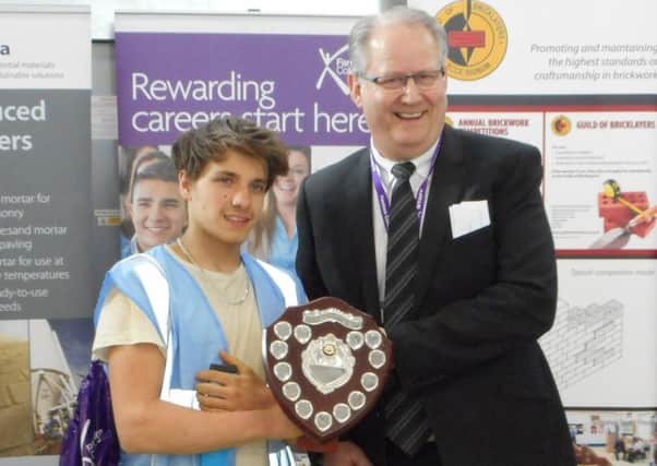 Rhys Mathews receives his award