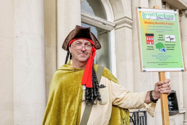 Hugh La Trobe dressed as a town crier to draw some attention for a Bexhill Town Forum meeting. Photo by Bill Coney