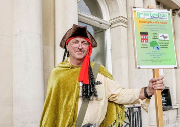 Hugh La Trobe dressed as a town crier to draw some attention for a Bexhill Town Forum meeting. Photo by Bill Coney