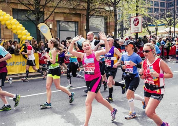 Amy Ross runs the marathon for the Girl Guides SUS-160429-130718001