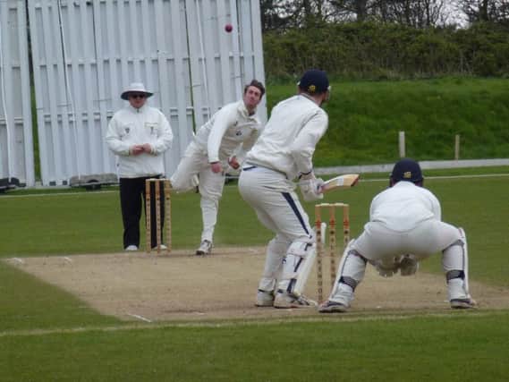 Jack Coleman bowling for Hastings Priory during their ECB National Club Championship victory at home to Hartley Country Club last weekend. Picture by Simon Newstead (SUS-160424-163652002)