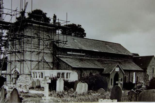The church tower being reconstructed in 1950