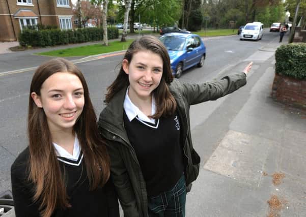 Year 10 Students Arianne Puttock and Hayley Pope from Millais School are campaigning for a pedestrian crossing on Kings Road near Kingslea Primary School.  Pic Steve Robards  SR1612574 SUS-160305-171516001