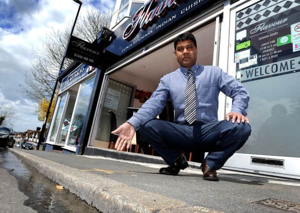 Restaurant owner Mustak Miah outside his restaurant in Burgess Hill