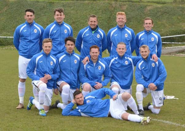 Team photo before the game. Picture by Grahame Lehkyj