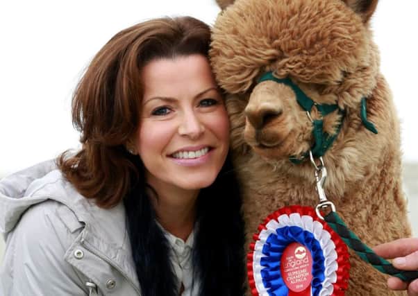 Natasha Kaplinsky made a surprise visit to the Spring Garden & Leisure Show at Ardingly this weekend, presenting the Supreme Champion rosette to a Huacaya Alpaca from Houghton Hall Alpacas.