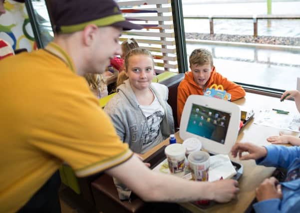 McDonald's launches a new table service. Photo by Joel Goodman.